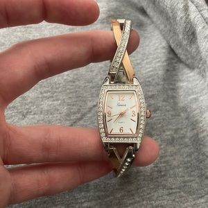 Silver and rose gold watch